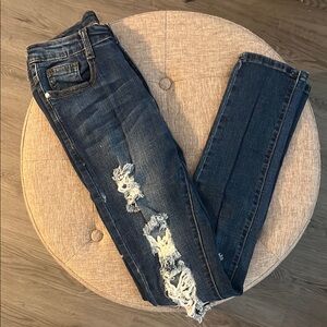 Distressed Dark Blue Jeans